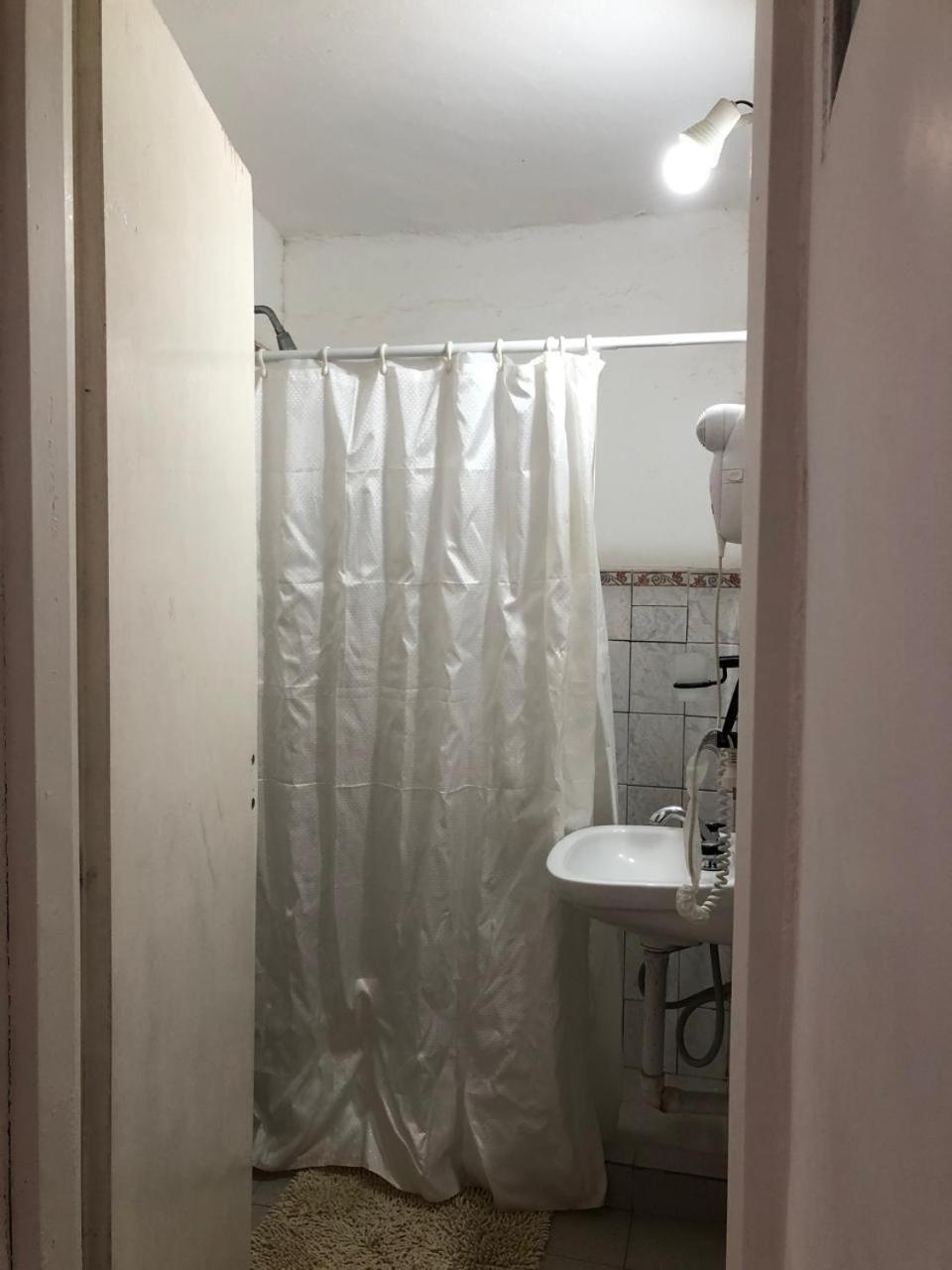 El Faro Hostel Пуерто Мадрин Екстериор снимка